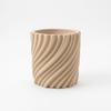 Modern wavy beige flowerpot for plants, twisted shape