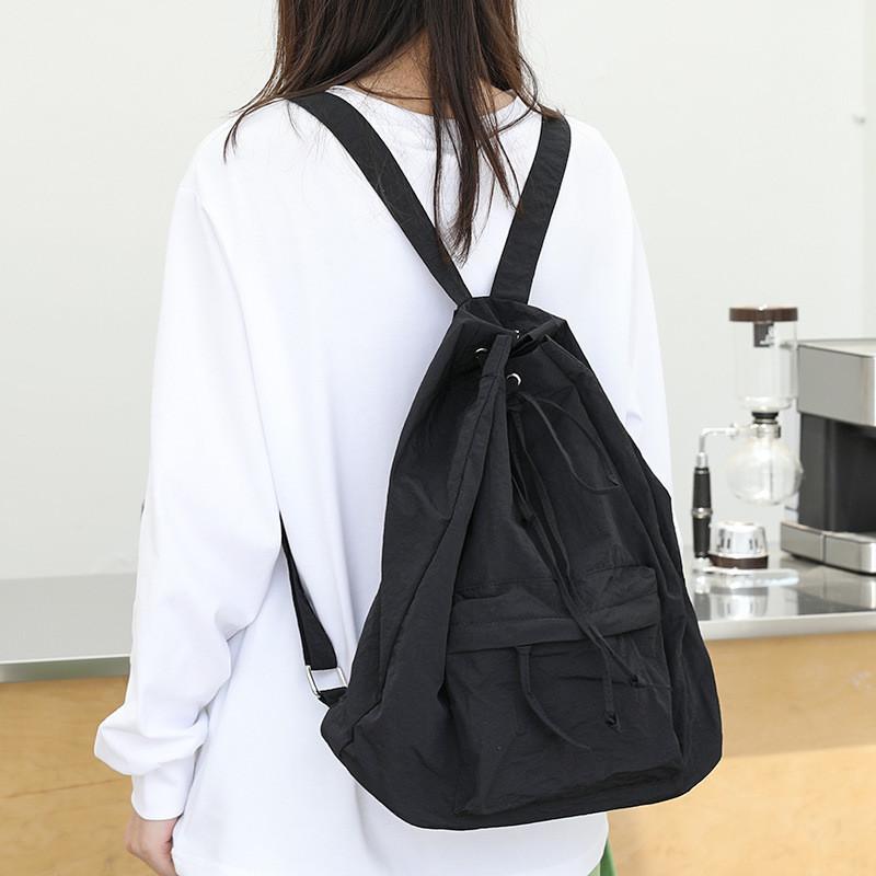 IELGY Korean Version of Casual Literary Canvas Backpack, Fashionable Nylon Solid Color Small Fresh Drawstring Backpack