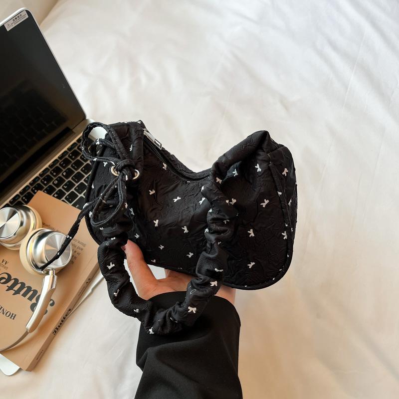 Beautiful foreign style bow one shoulder armpit bag women's summer new high value crescent bag pleated handbag