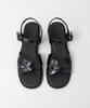 Heenn Shiny Leather Crossover Sandals. Black
