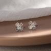 Four-leaf Flower Stud Earrings Female Rotating Shiny Lucky Flower Ear Jewelry Small Fresh Korean Version Niche Design Accessories