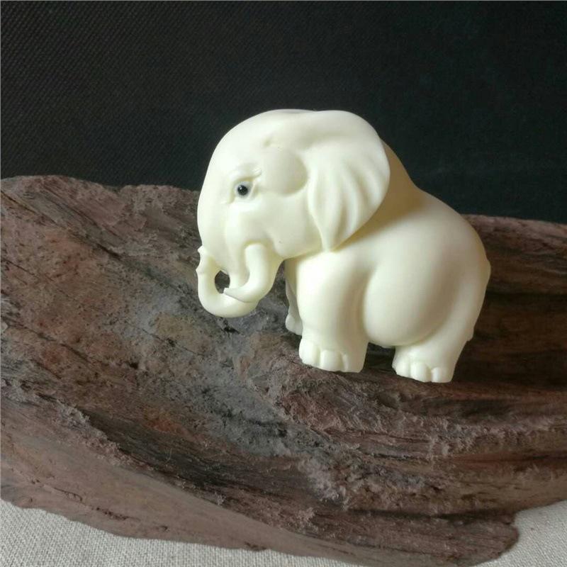 Elephant Ornament: Hand-Carved Ivory Nut for Auspicious Wishes - Ideal for Car or Office Decor