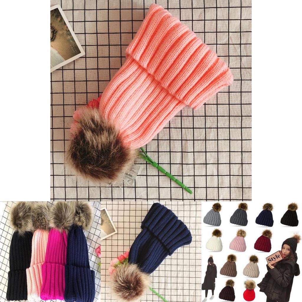Уютная женская зимняя шапка с пушистым помпоном и стильным отворотом