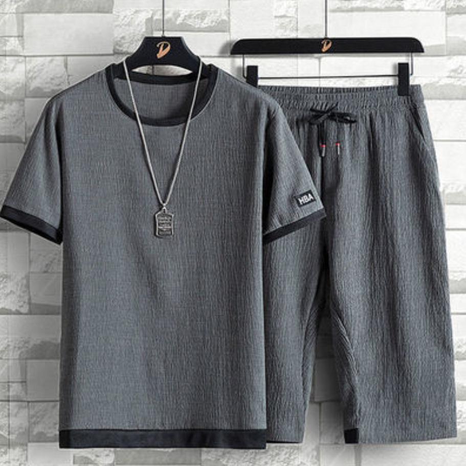 Men's Summer Ice Silk Two-Piece Set: Short-Sleeve Shirt and Cropped Pants, Loose Fit, Casual Sports Style, Large Size Available.