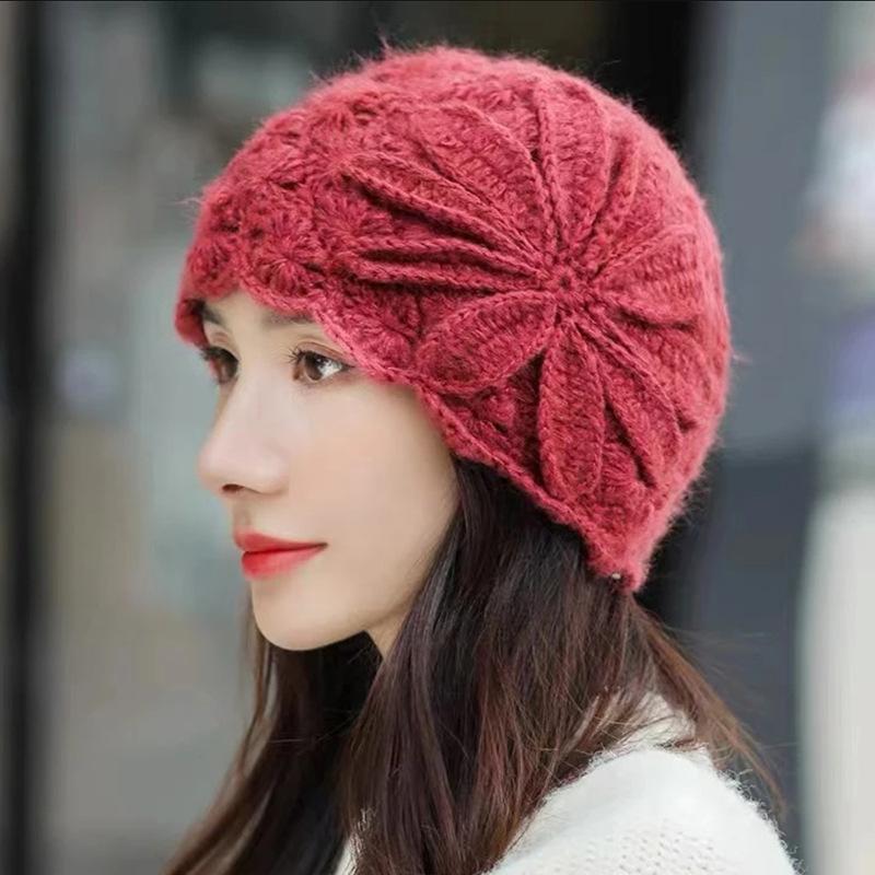 Autumn and winter fashion hollow knitted wool hat women's ear protection simple fashion big head circumference cold hat flower pullover hat