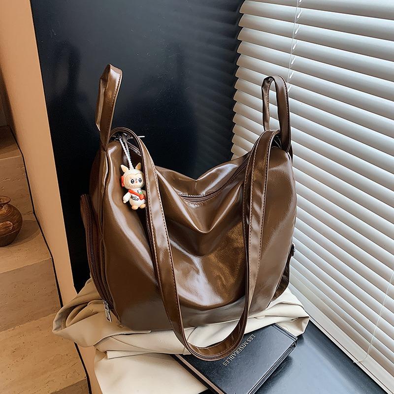 Женская сумка-тоут большой вместимости, новая нишевая сумка-мессенджер через плечо, сумка для通勤, повседневный многофункциональный рюкзак