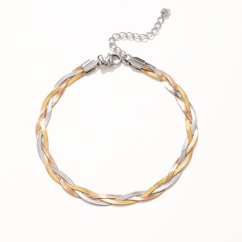 Браслет из розового золота с обмоткой и лезвием из нержавеющей стали