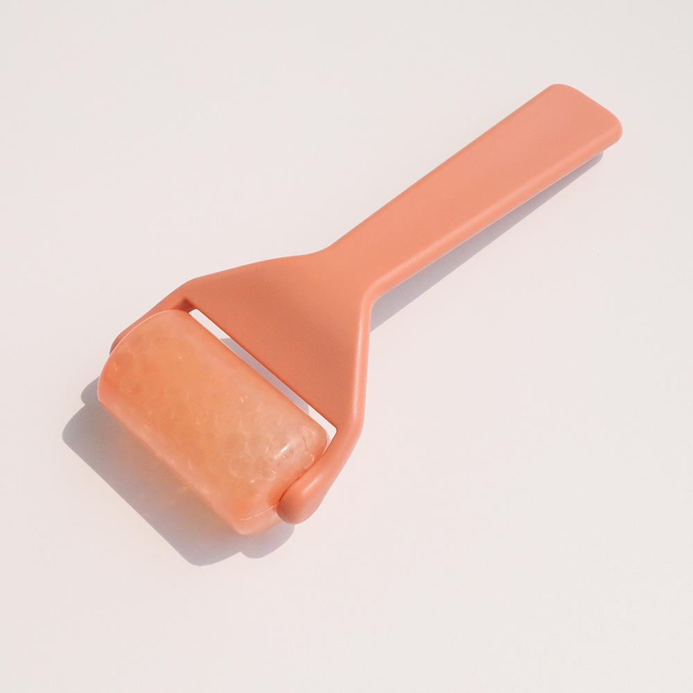 Полупрозрачный массажер-ролик для лица и кожи