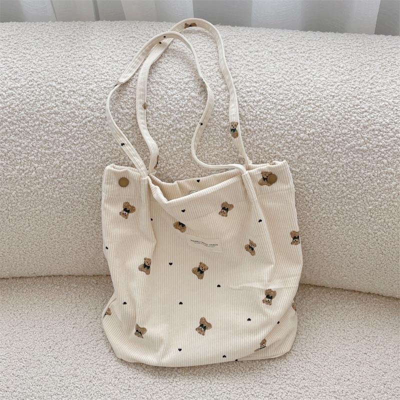 Copyright model, corduroy cartoon printed bear large-capacity portable shoulder bag, student armpit bag for class