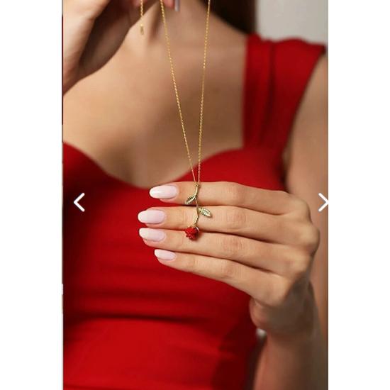 Фея привела освещенную неувядающую красную розовую лампу и подвеску с покрытием из розового золота в стеклянном куполе