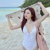The source is a triangular one-piece sexy deep V small chest gathering girl 1011 new hot spring swimsuit