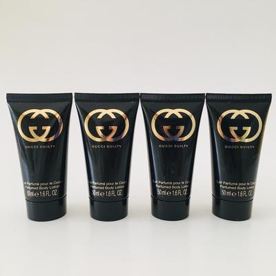 Парфюмированный лосьон для тела Guilty 200 мл (4x 50 мл)