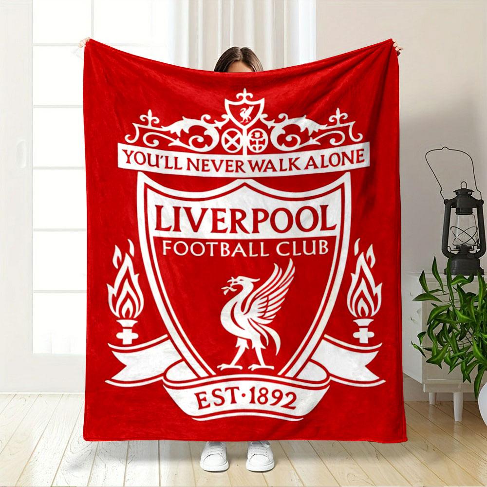 A red shield with white text, a Liver bird, torches, and ornate details. for all seasons blanket lunch break throw gift