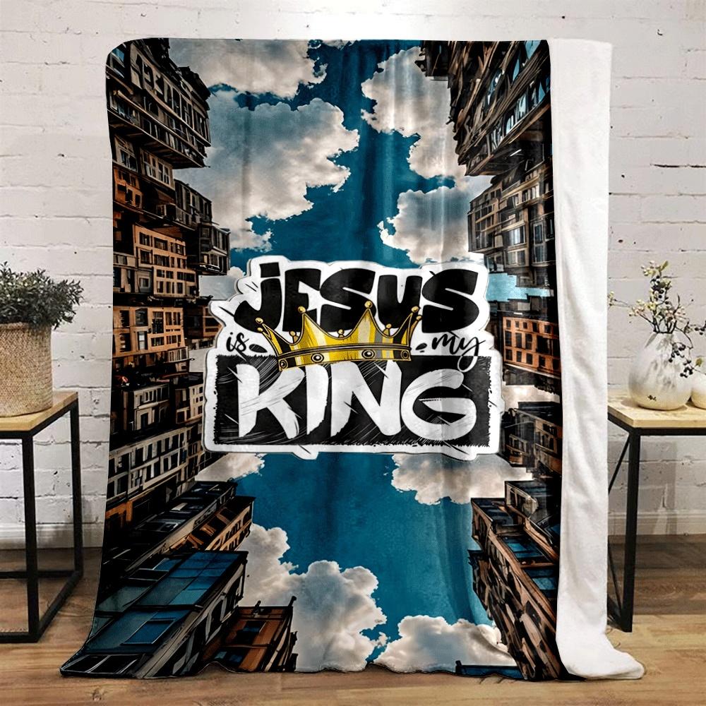 Text "Jesus is my King" overlaid on buildings converging toward the sky. for all seasons blanket lunch break throw gift