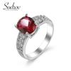 Классические женские обручальные кольца SODROV с красным цирконом