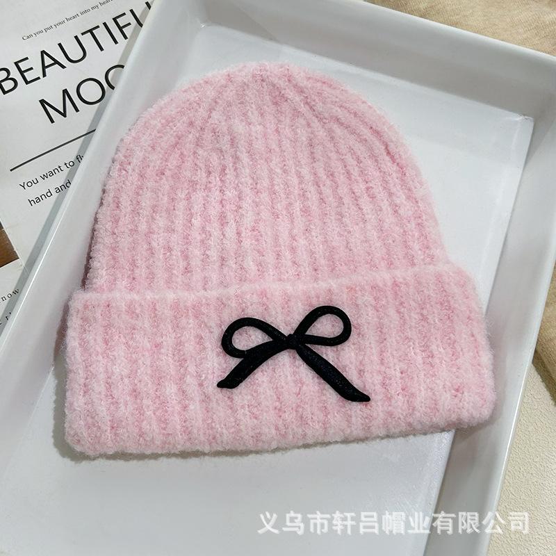 Versatile fashion embroidered bow knitted hat autumn and winter new solid color versatile warm wool hat cold hat