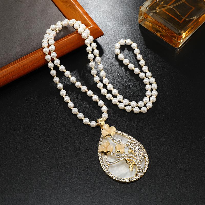 Длинное и изысканное колье, хрустальный кулон, цепочка для свитера, высококачественное и универсальное колье, простые и высококачественные аксессуары для цепочки для свитера.