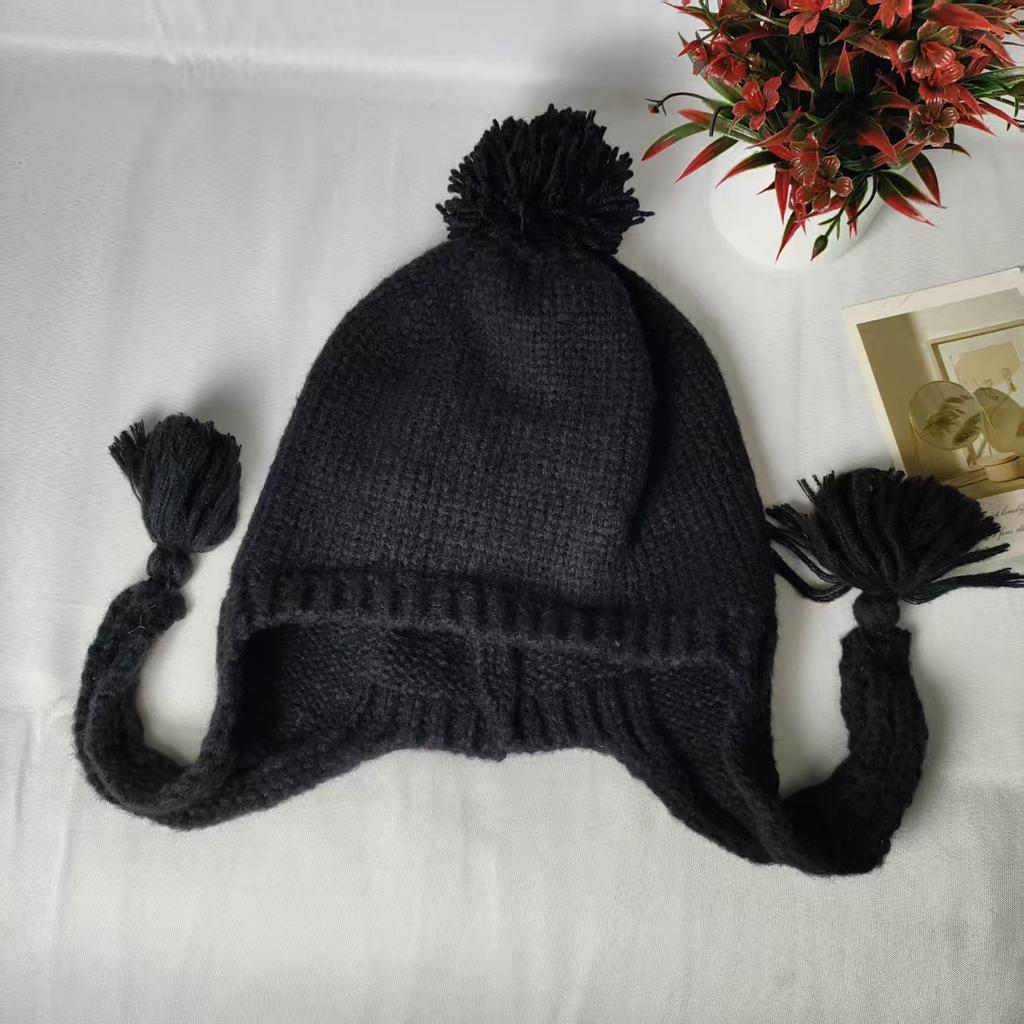 Solid color casual versatile braided hat autumn and winter cute knitted hairball hat warm and cold ear protection wool hat women