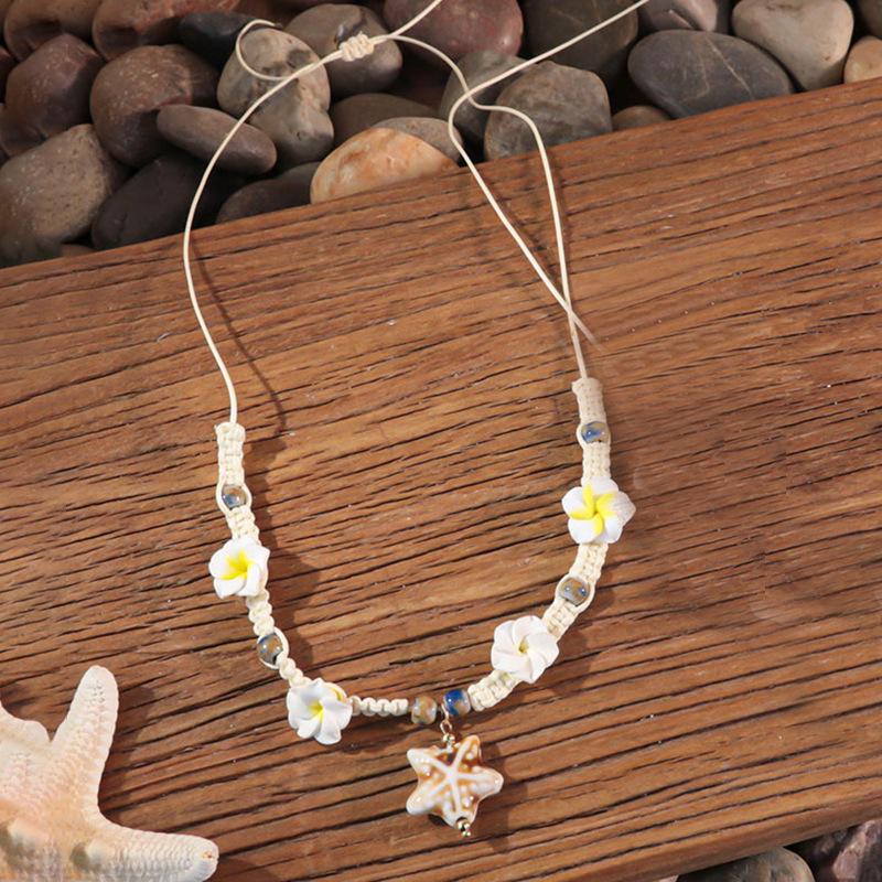 Bohemian vacation style egg flower necklace earrings set ins niche flower soft pottery color collarbone chain tide