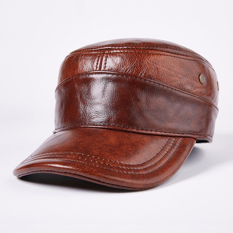 Кожаная бейсболка. Первый слой. Кепка из коровьей кожи с плоским верхом. Теплые уши осенью и зимой.