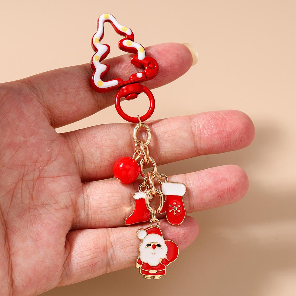 Festive Keychain: Christmas Jewelry with Santa, Snowman, Tree, and Candy-themed Pendant