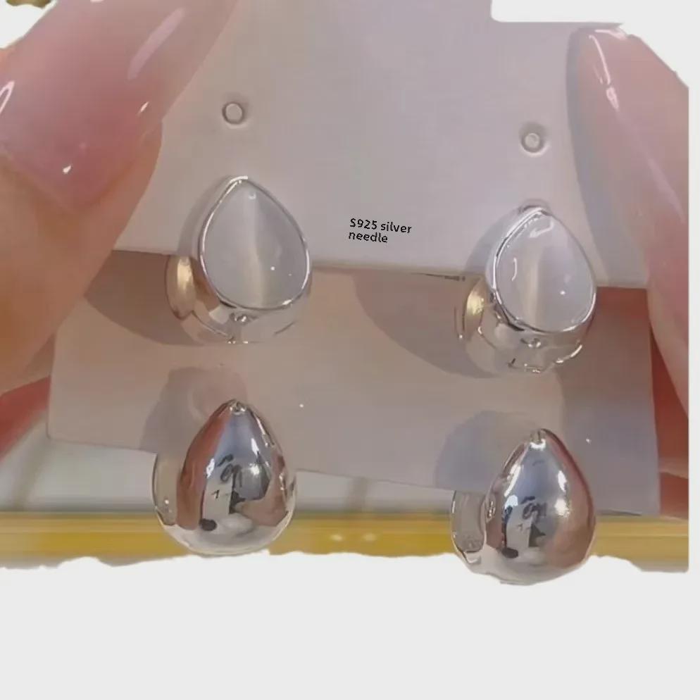 Элегантные серьги-капли с камнем кошачий глаз — универсальные, легкие, роскошные, изысканного дизайна.