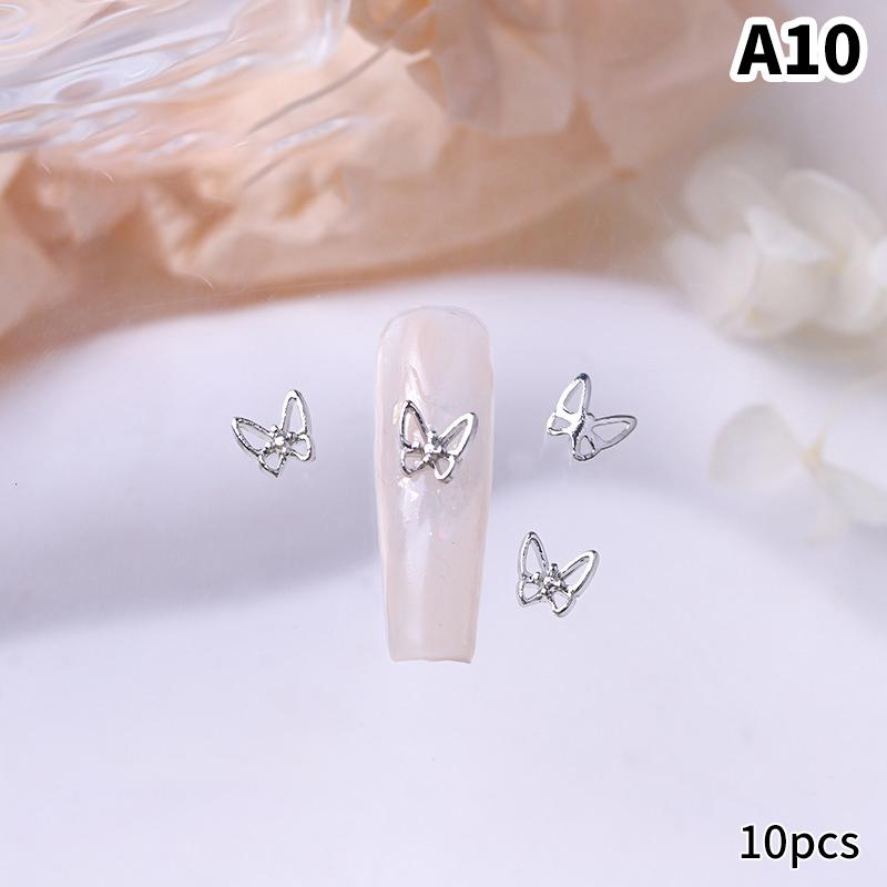 10 шт./пакет в форме бабочки, звезда, цветок, подвеска для ногтей, серебряный сплав для ногтей, жемчужные украшения, аксессуары, принадлежности для ногтей