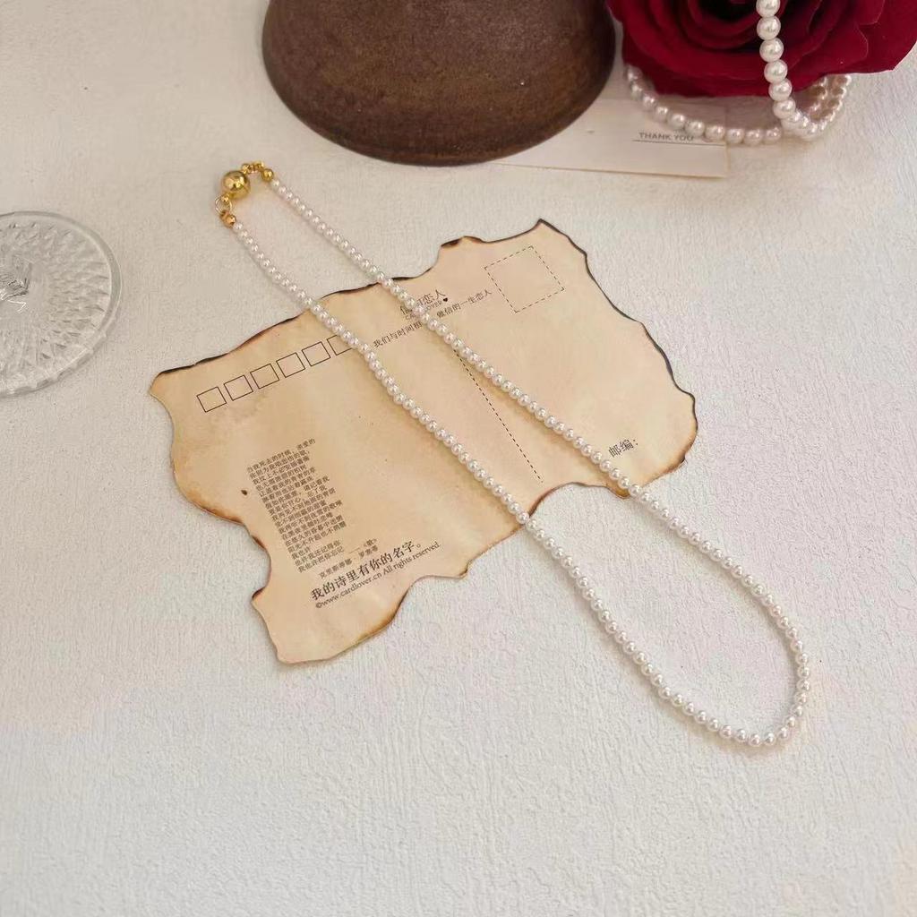 Elegant Magnetic Pearl Clavicle Necklace – High-End Versatile Sweater Chain for Women