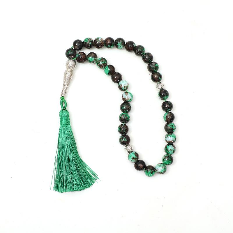 Ближневосточные исламские четки: 33 крупных стеклянных бусины в форме цветка диаметром 10 мм.