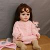 Реалистичные имплантированные вьющиеся волосы Reborn Baby Doll Girl Реалистичная 55 см Полностью виниловая кукла для моделирования тела Красота Розовая свинья Вязаная одежда Кукла Детская игрушка