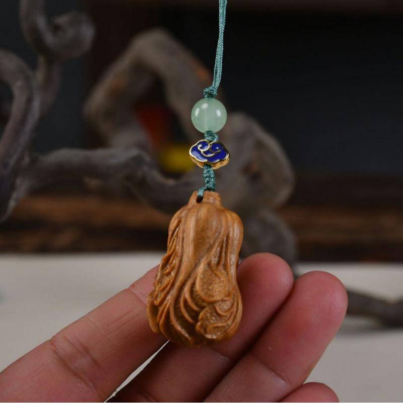 Twelve Zodiac Animal Charms Green Sandalwood Set: Rat, Ox, Tiger, Rabbit, Dragon, Snake, Horse, Sheep, Monkey, Rooster, Dog, Pig.