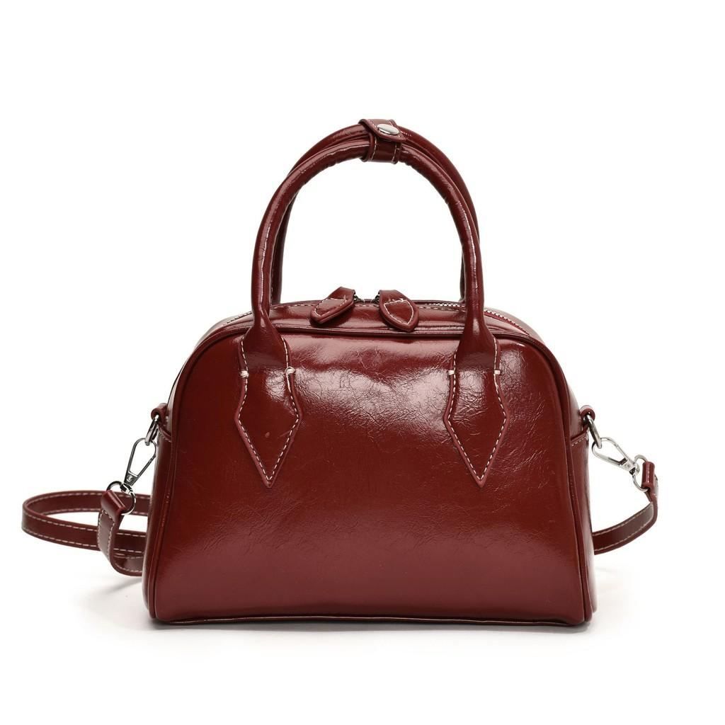 Ielgy Handbag Niche Oil Wax Leather Boston Female Bag Fashion Commuter Bag