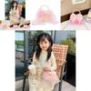 Lovely And Eye-catching Pearl Handled Bowknot Purse For Kids In Soft Pink For Daily Wear