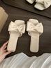 Flat-bottomed bow French small cool slippers fairy shoes 2025 new summer vacation beach shoes yellow sandals
