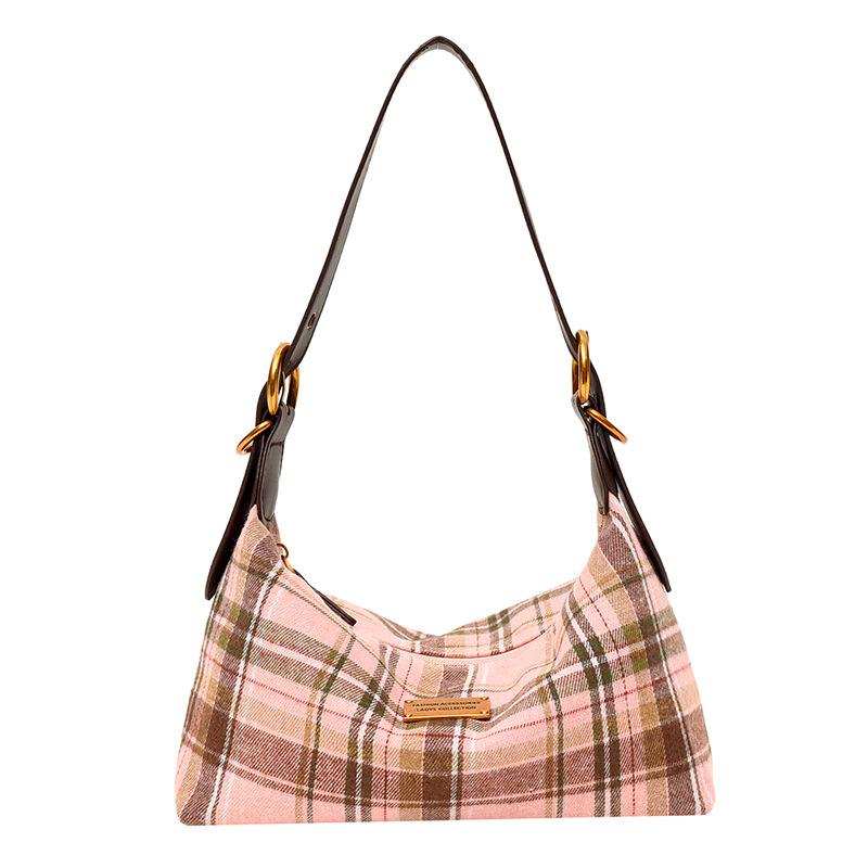 Single-shoulder Underarm Small-sized Casual Tote Bag with Textured Fabric and Adjustable Strap for Commuting.