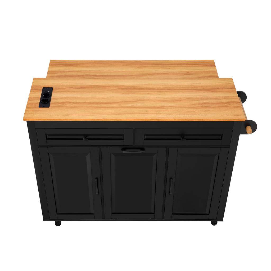 Kitchen island on casters, pull-out dining area with worktop and waste bin compartment, with power sockets (Black)