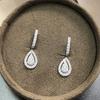 Huitan Copper Color Pear Shaped Drop Earrings for Women Full Paved White Cubic Zirconia Delicate Girl Earrings Statement Zircon