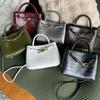 2026 Crocodile Pattern Cowhide Handbag Retro Light Luxury Commuter Fashion Butterfly Buckle Single Shoulder Crossbody Bag for Women