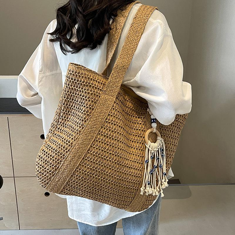 2025 New Straw Plaited Woven Women's Roomy Bag Casual Versatile Single Shoulder Bag High Capacity Seaside Beach Bag Vacation Commuter Large Tote Bag
