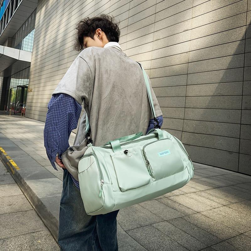 Men's and women's simple sports outdoor fitness treasure hand luggage bag going out to play large capacity multi-pocket travel bag