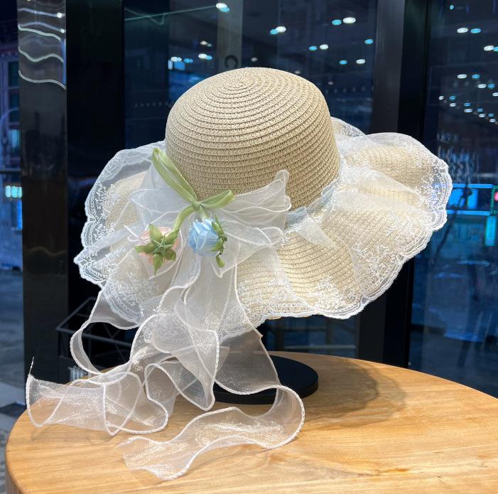 Bow flower big brim beach straw hat women spring and summer new seaside sunshade sun hat tide