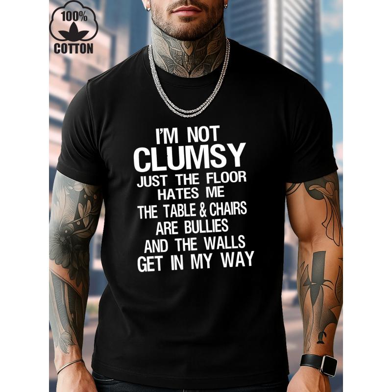 Men's Funny Saying T-Shirt - "I'm Not Clumsy, Just the Floor Hates Me" - Black with White Text - Heavyweight Cotton Crew Neck Tee - Loose Fit Casual