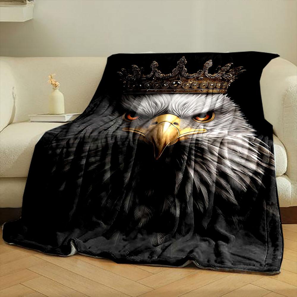 A regal eagle with detailed feathers wearing an ornate golden crown. for all seasons blanket lunch break throw gift