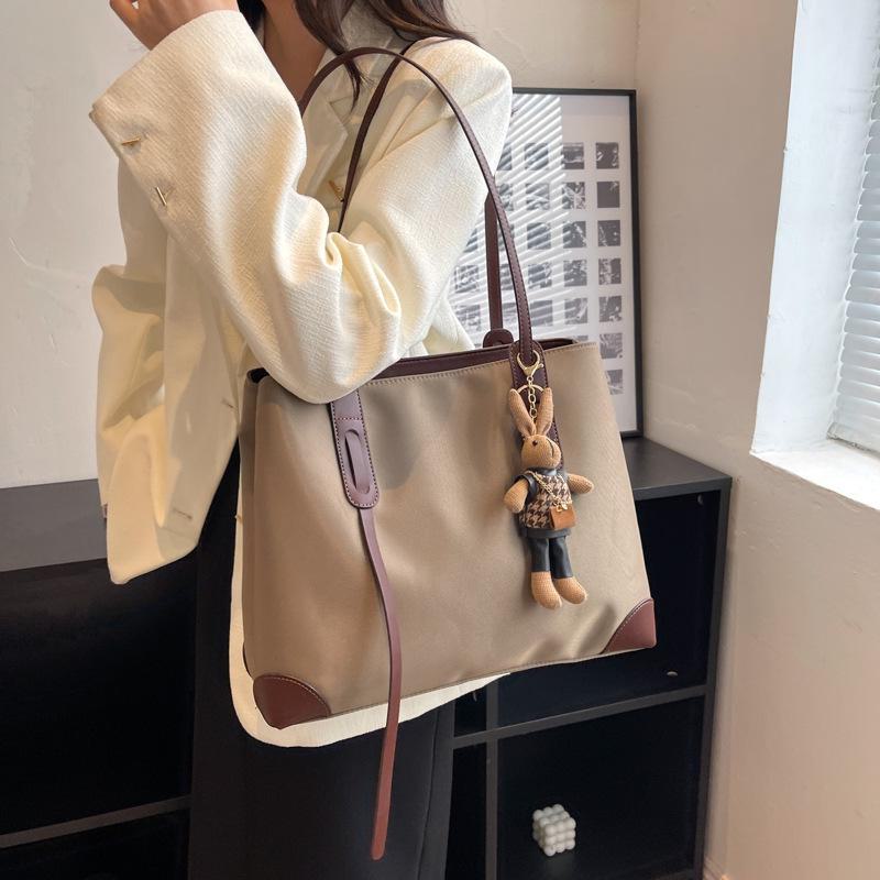 Женская сумка-тоут большой вместимости весна 2024 г.: Простая сумка через плечо и для поездок на работу в стиле нишевой моды