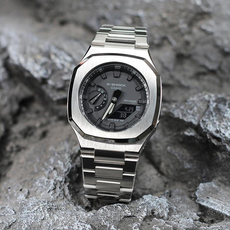 Casio Унисекс Серия с двойным жидкокристаллическим/аналоговым дисплеем Черные часы GA-2100-1A1(Watch4--)