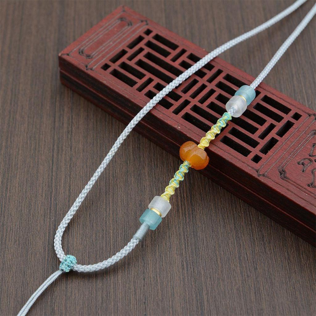 Плетеное макраме ожерелье с кристаллом авантюрина и подвеской из тыквенного нефрита