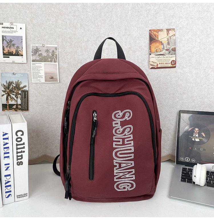 Schoolbag Korean version of the letter simple casual load reduction ridge protection versatile large capacity schoolbag junior high school student