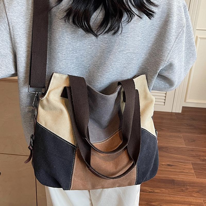 Canvas bag women's bag new Korean version of fashion leisure travel shoulder bag large capacity versatile women's portable messenger bag