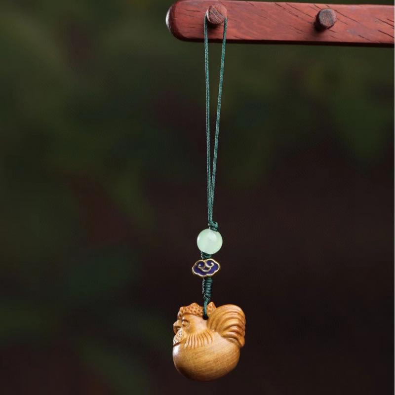 Twelve Zodiac Animal Charms Green Sandalwood Set: Rat, Ox, Tiger, Rabbit, Dragon, Snake, Horse, Sheep, Monkey, Rooster, Dog, Pig.