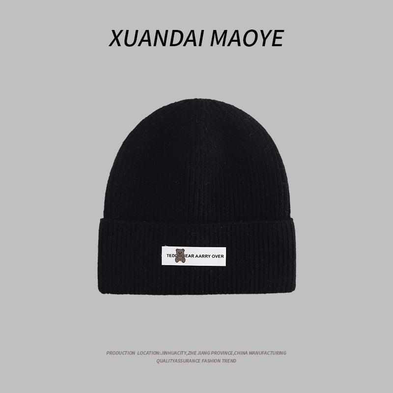 Осенние и зимние шапки женские плюшевые новые вязаные шапки универсальные теплые защитные наушники шерстяные утолщенные модные студенческие шапки